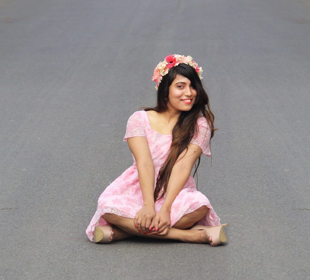 Shrizan Sitting Smiling In Pink Dress