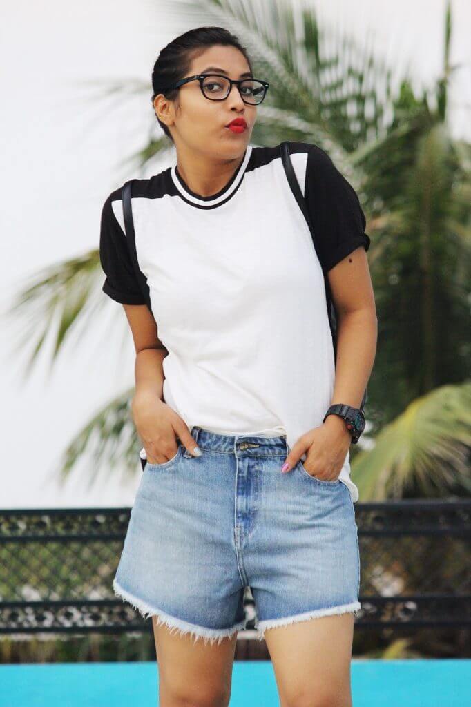 Shrizan Wearing White And Black Tee Slight Pout Looking Front