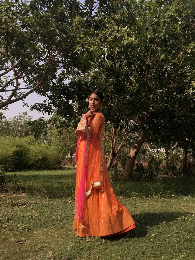 Shrizan Posing In Wedding Dress Red Lehenga Crop Top Matching Purse