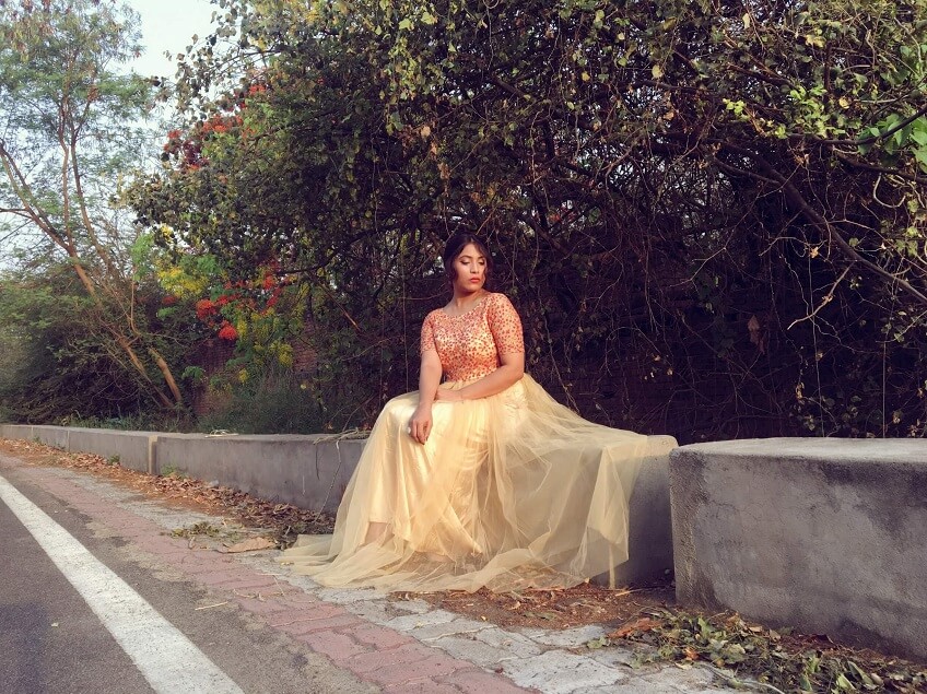 Shrizan Sitting Posing Golden Gown Wedding Dress Idea